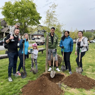 Surrey residents participating in an Arbor Day tree planting event