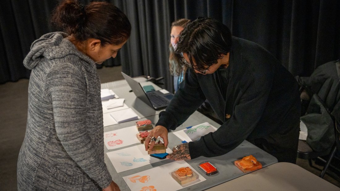 people doing stamp craft