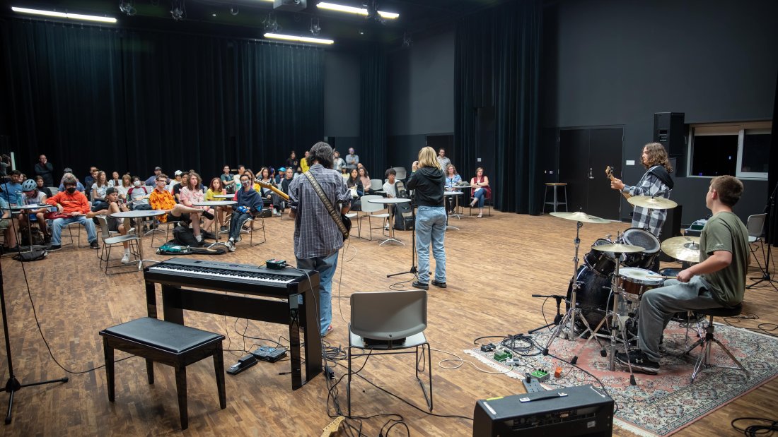youth musicians performing in studio to small audience