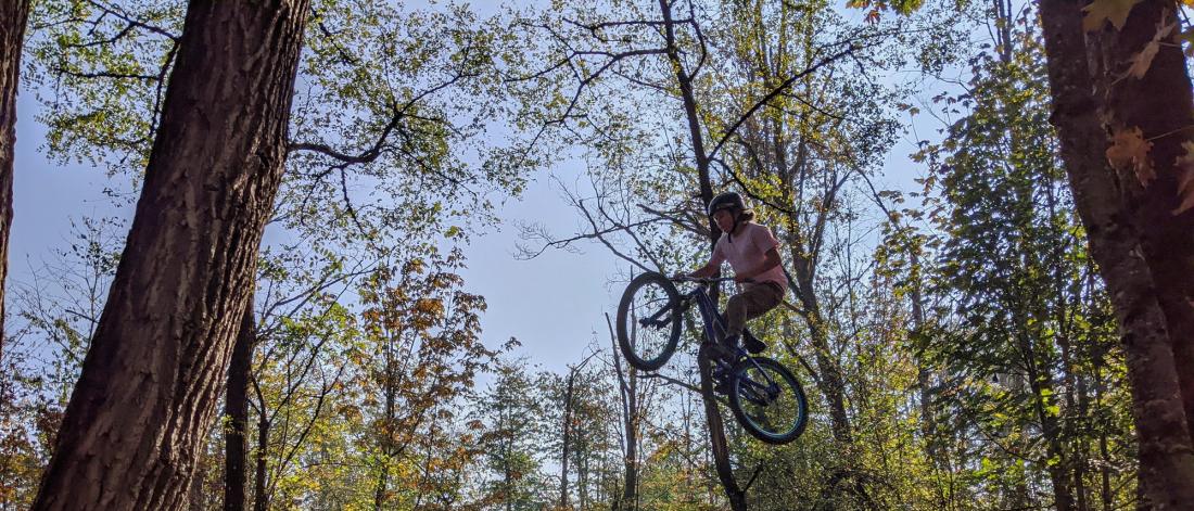 A person jumping their bike