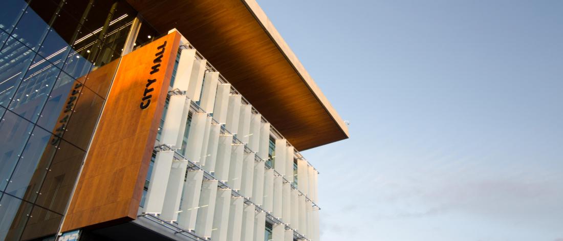 Surrey City Hall from plaza entrance at sunset