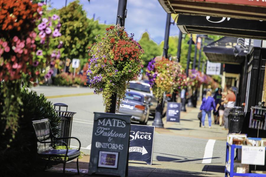 sandwich board signs and flower baskets