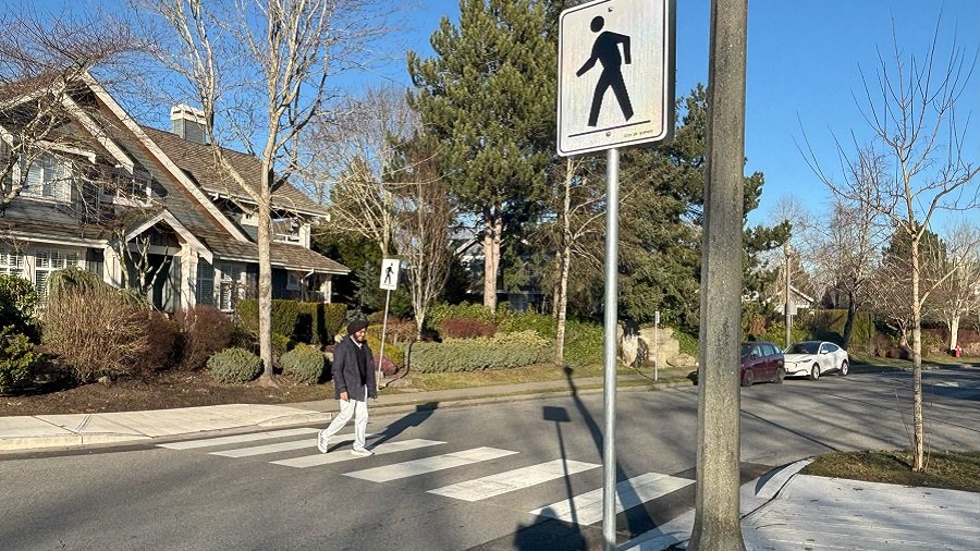 person using crosswalk