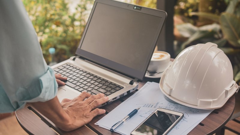 developer using laptop 