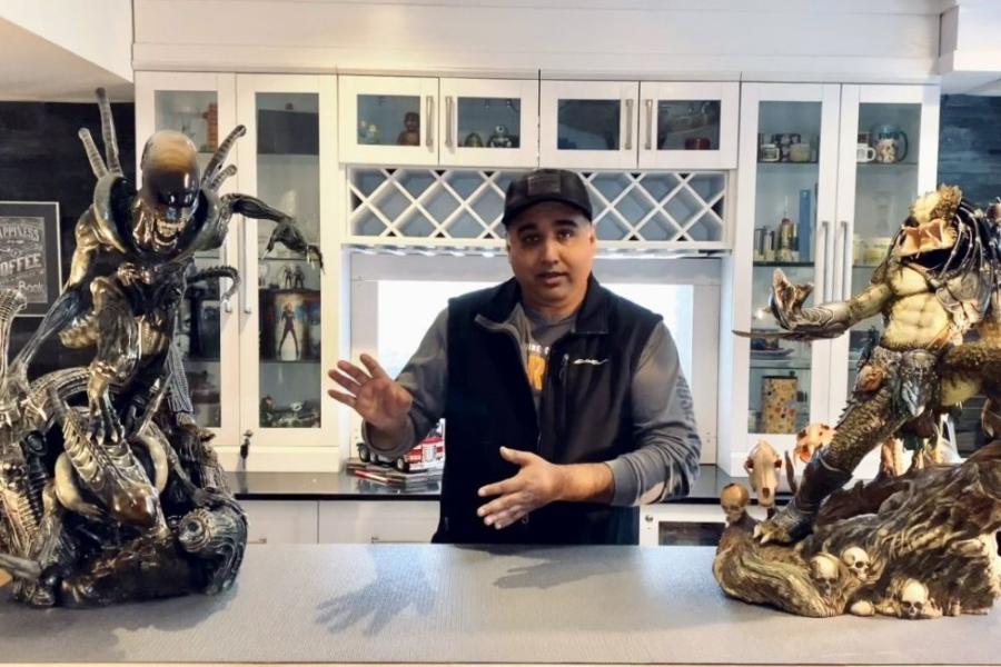 Dilber Mann with items from his collection