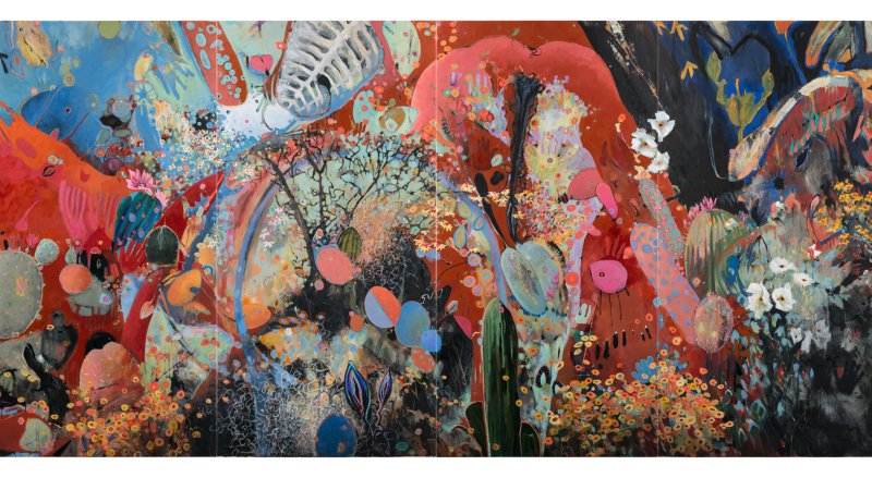 Blues and reds create a cacophony of flowers, swirling, fruiting upwards. Black tree branches can be seen. 