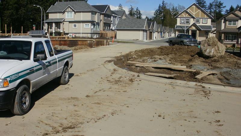 Construction site with City vehicle.