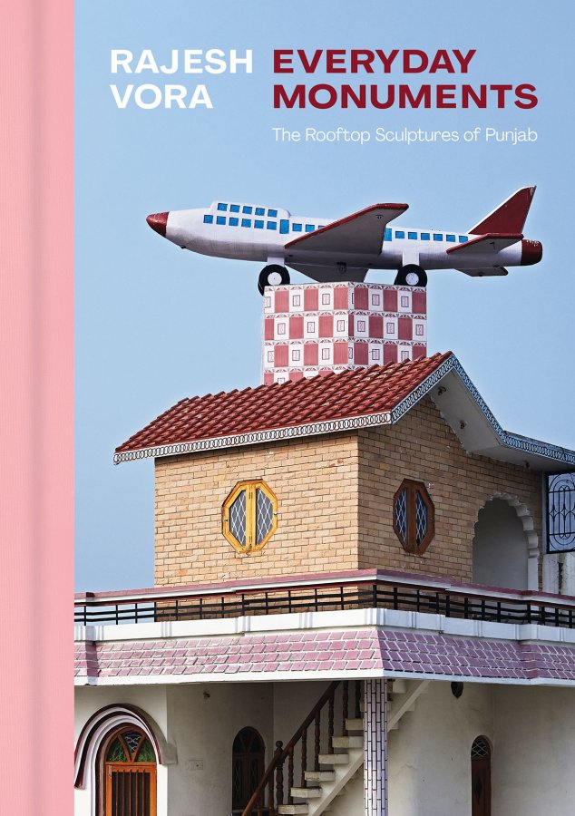 Front cover of Rajesh Vora: Everyday Monuments, featuring a sculpture of an airplane affixed to the roof of a home