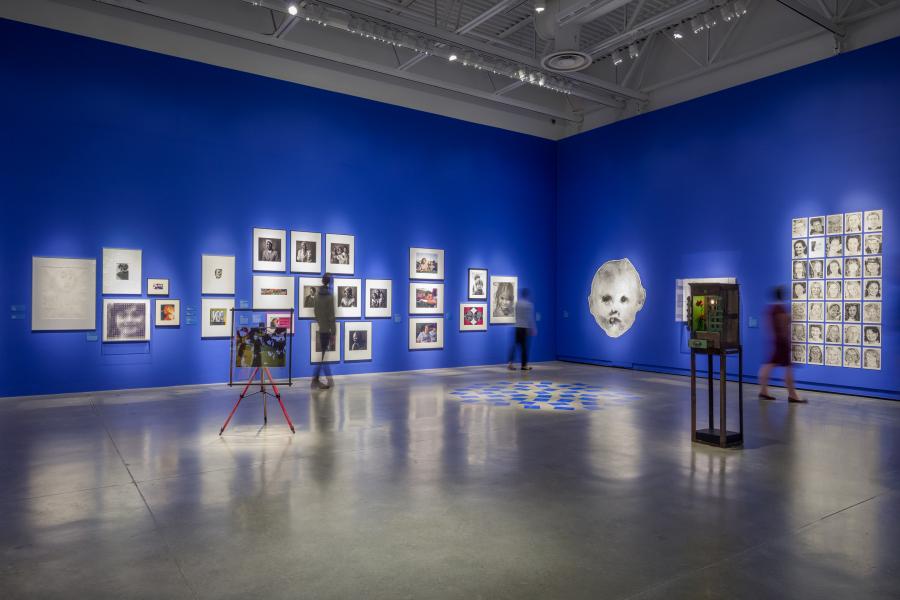 Visitors in Surrey Art Gallery's exhibition Facing Time
