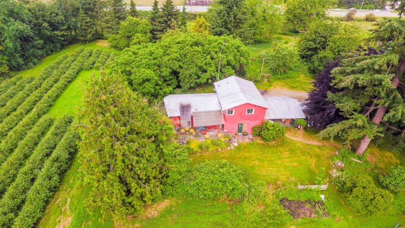 An aerial image of a red barn.