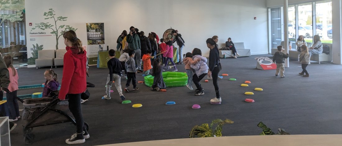 kids and their parents taking part in a Stay and Play for Father's Day at the Museum of Surrey