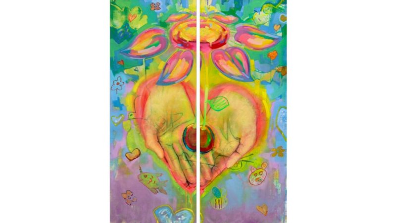 Colorful street art banners with abstract floral and heart motifs.
