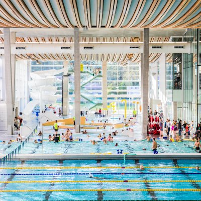 People swimming in a pool.