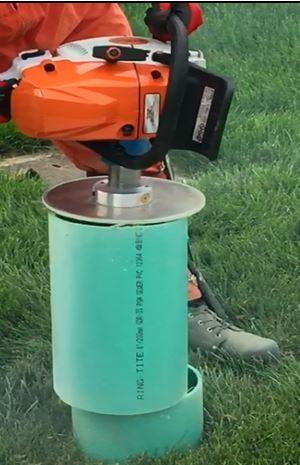 sawing an inspection chamber pipe