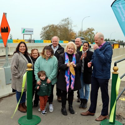 Mayor Brenda Locke cuts the ribbon at the opening ceremony for the new Nicomekl River crossing on Nov. 15, 2023. From left: Kwantlen First Nation artist Phyllis Atkins, Semiahmoo First Nation artist Joan Williams (green sweater), Councillor Mike Bose, Councillor Doug Elford, Councillor Pardeep Kooner and Jeff Busby, VP of Engineering for TransLink.
