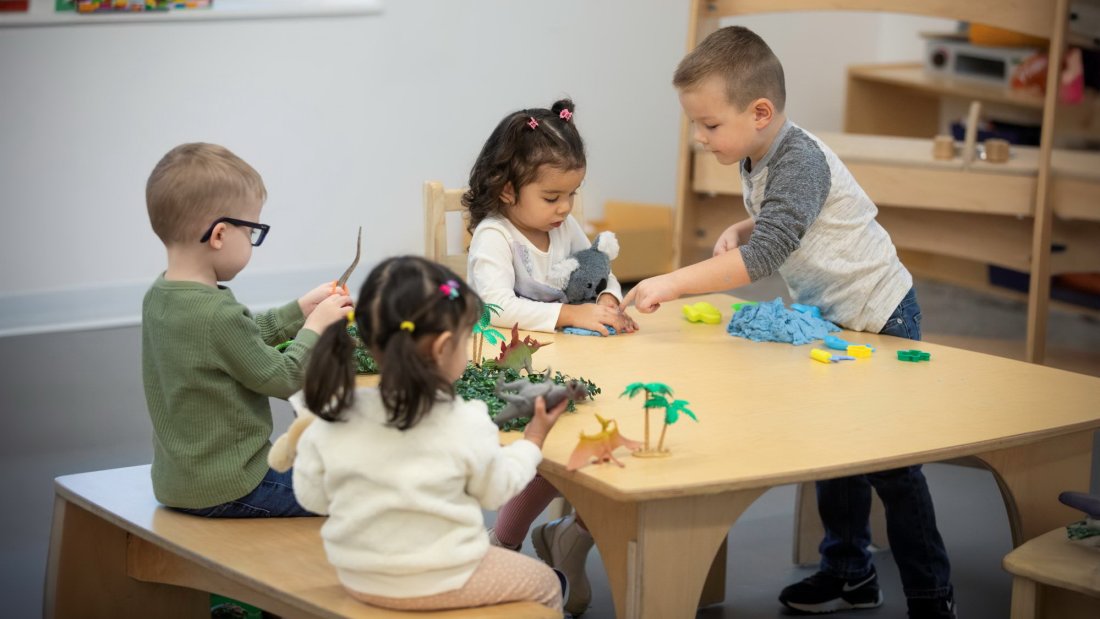 Four kids playing together.