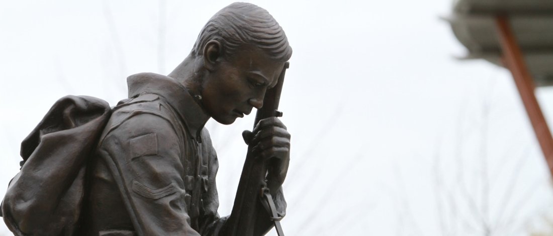 Statue of a soldier sitting