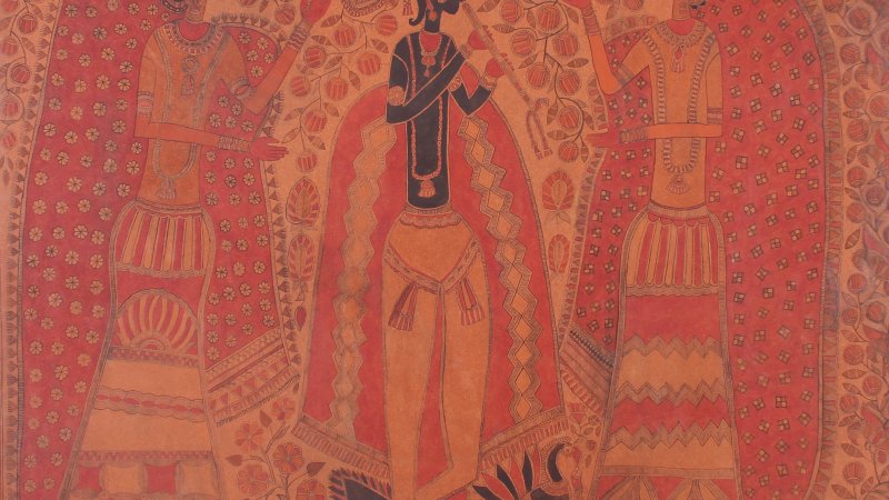  Three people are standing. The figure in the middle has black skin and is in between two people who have hair buns and long skirts. 