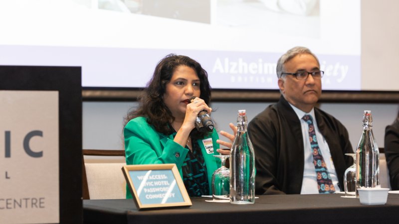 Two guest speakers presenting at an event.