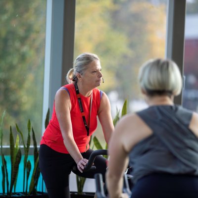 Fitness Instructor teaching a spin class.