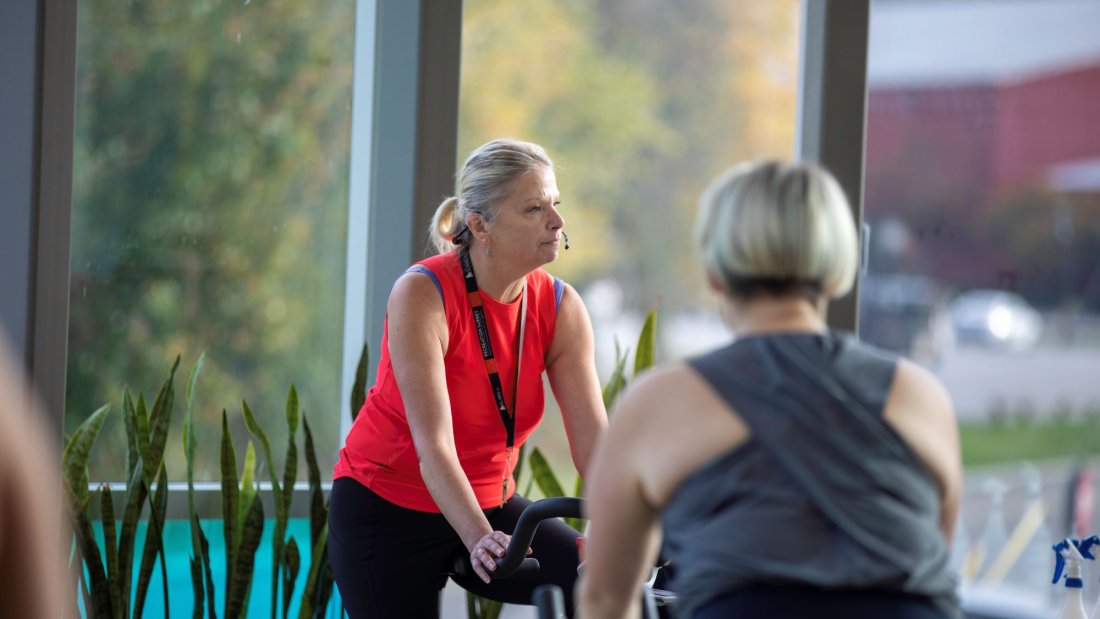 Fitness Instructor teaching a spin class.