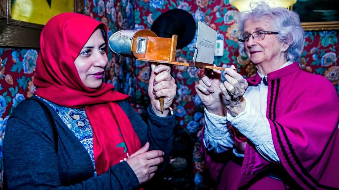 Volunteers demonstrating a stereoscope