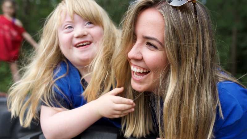 Two females looking happy 