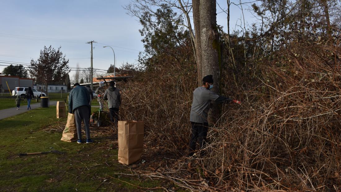 Youth volunteers in a park.