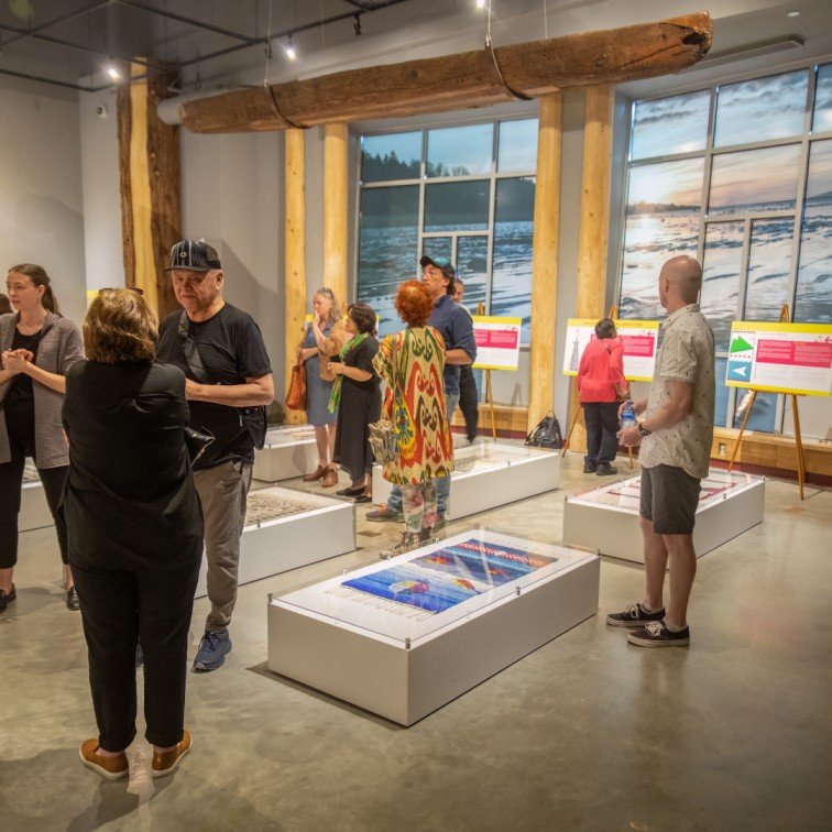 people at museum of surrey exhibit