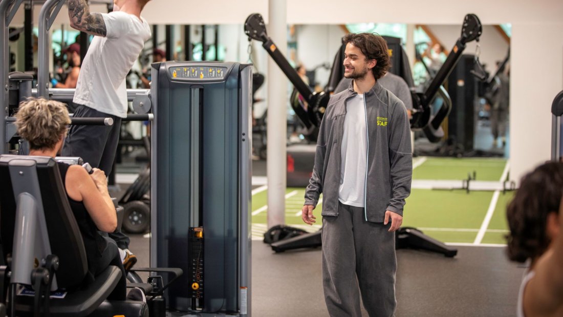 A person walking in the gym.