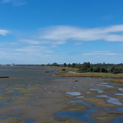 flood plains and a blue sky