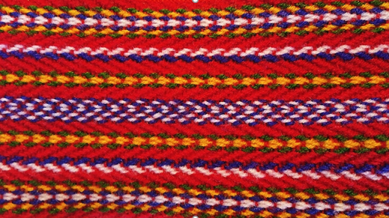 a traditional sash featuring intricate patterns and details
