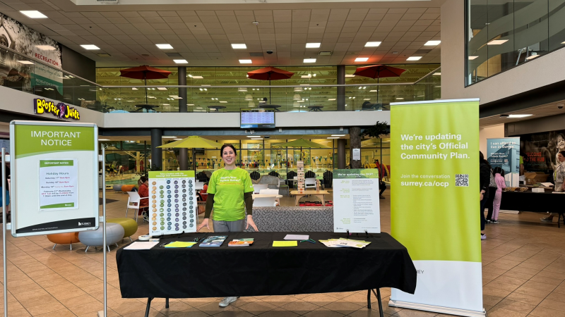 City staff managing an engagement booth at an OCP event